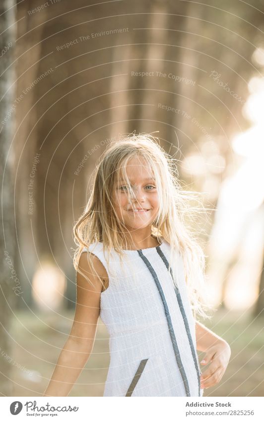 Lovely child in sunlight Girl Portrait photograph Posture Innocent Summer Expression Nature Purity Style hands crossed Child Delightful Fresh Sun Recklessness