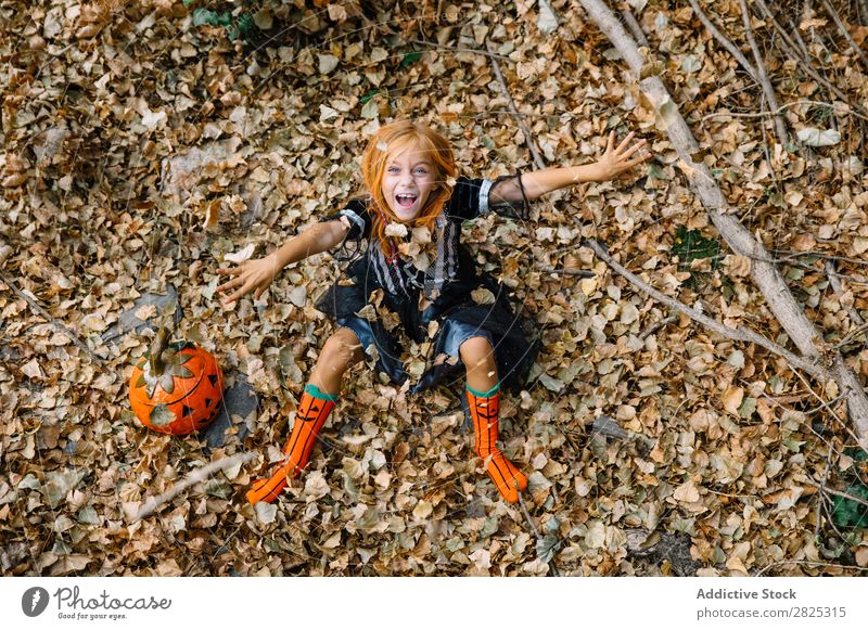 Cheerful girl playing with foliage Girl throwing Leaf Vacation & Travel Costume Hallowe'en Autumn Laughter Happiness Nature Seasons Excitement Joy Park Playing
