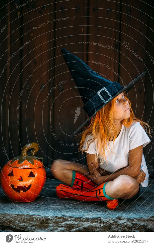 Adorable girl posing on porch Girl Hallowe'en pretend terrify Posture Portrait photograph Cheerful House (Residential Structure) Costume Feasts & Celebrations