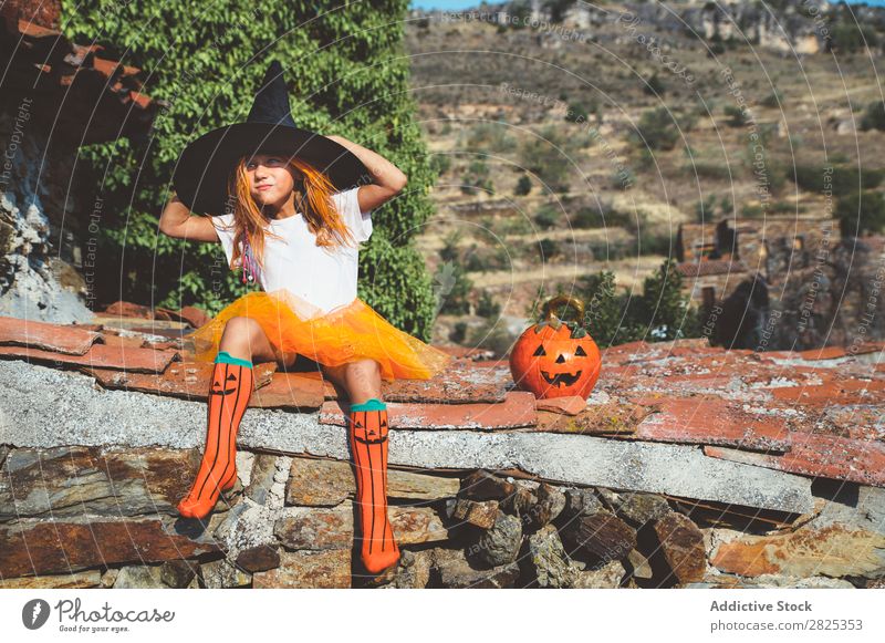 Girl in costume posing on roof Costume Hallowe'en Playful rooftop Feasts & Celebrations Posture Intellect Tradition Expression Seasons Guest Street Infancy