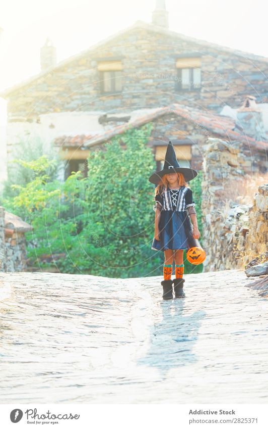 Little girl in witch costume Girl Hallowe'en Costume Witch Holiday season Guest Posture Tradition Carnival Earnest Occasion Child pretend Vacation & Travel