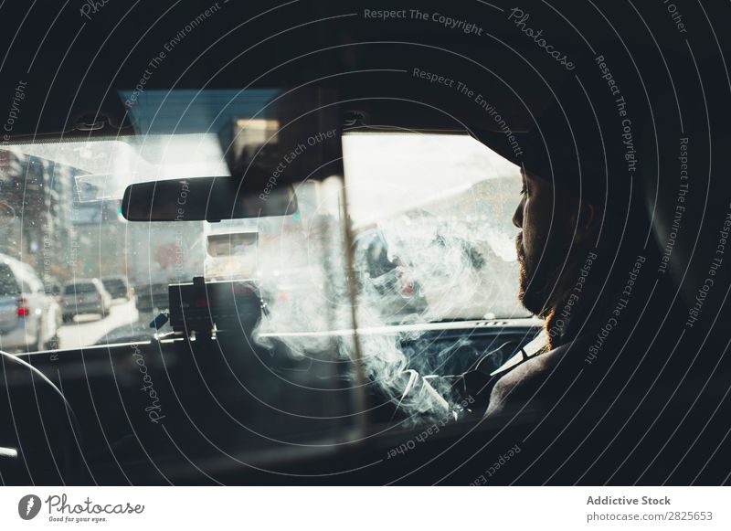 Man sitting in the car Smoking Taxi Vehicle Hat bearded Cigarette Self-confident Earnest Street Brutal Beard Human being City Hipster Adults Easygoing Lifestyle