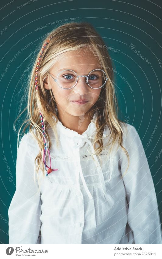 Cute schoolgirl posing in a classroom Girl Classroom Blackboard Person wearing glasses Cheerful Stand Education School Grade (school level) Student