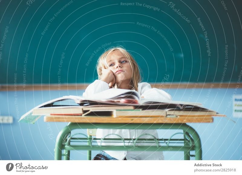 Bored girl in classroom Girl Classroom Blackboard Sit Desk bored Dull Dream Cute Education School Grade (school level) Student Youth (Young adults) Study Child