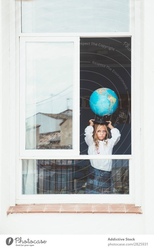 Schoolgirl posing with globe Girl Classroom Globe Window Map Posture Stand Cute Education Grade (school level) Student Youth (Young adults) Study Child Lessons