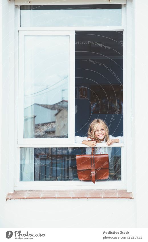 Schoolgirl posing with backpack in a window Girl Classroom Window Posture Stand Cute Education Grade (school level) Student Youth (Young adults) Study Child