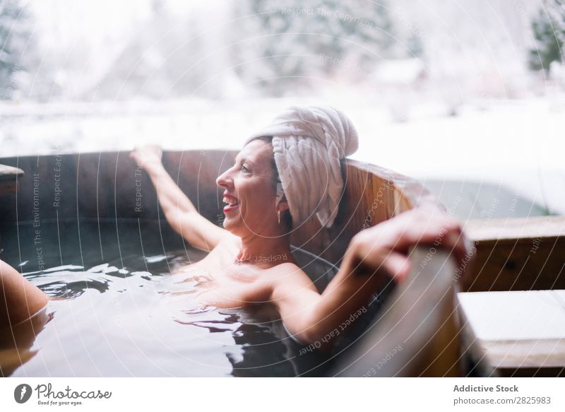 Cheerful topless woman in plunge tub Woman Swimming Nature Winter Lie (Untruth) Relaxation eyes closed Water Healthy Beautiful Vacation & Travel Romania