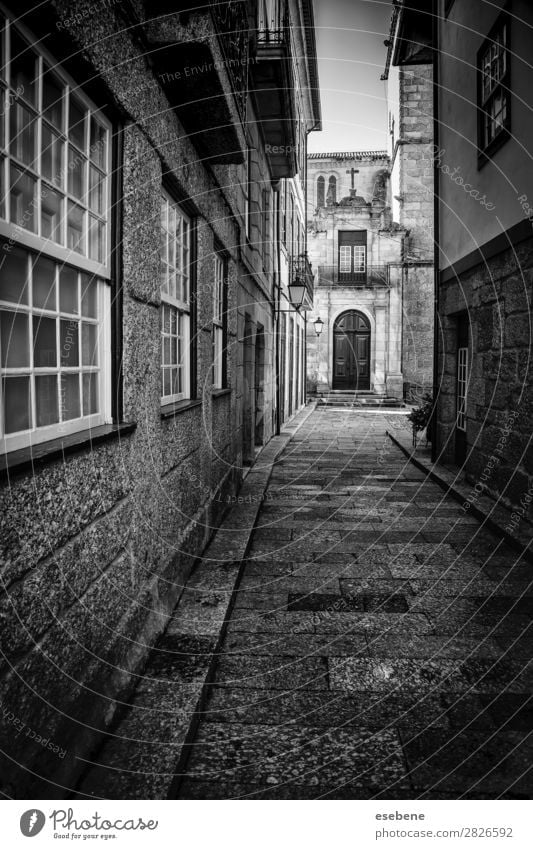 Old alley in the city Lamp Town Building Architecture Street Lanes & trails Stone Dirty Dark Retro Black Loneliness Dangerous Perspective City urban passage