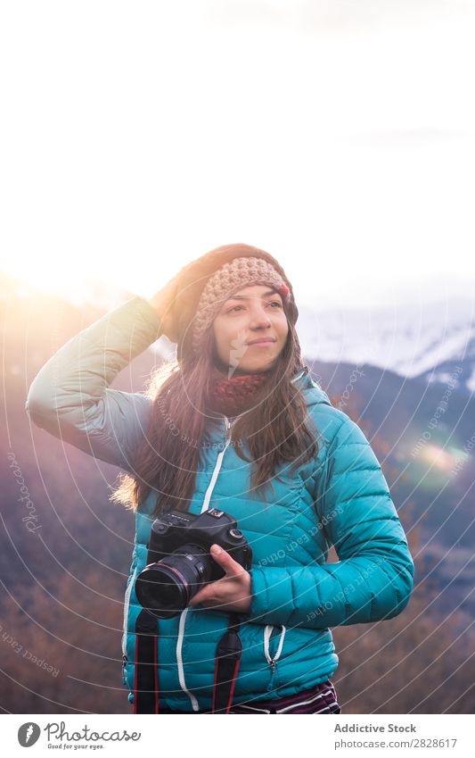 Woman with camera looking away Mountain Winter Photographer Looking away holding head Nature Landscape Vacation & Travel Girl Photography Human being Lifestyle