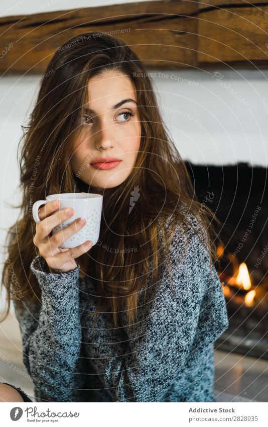 Beautiful model with cup of coffee Woman Home Cuddling Coffee Dream human face Posture Cup Pensive Considerate Lifestyle House (Residential Structure) Easygoing