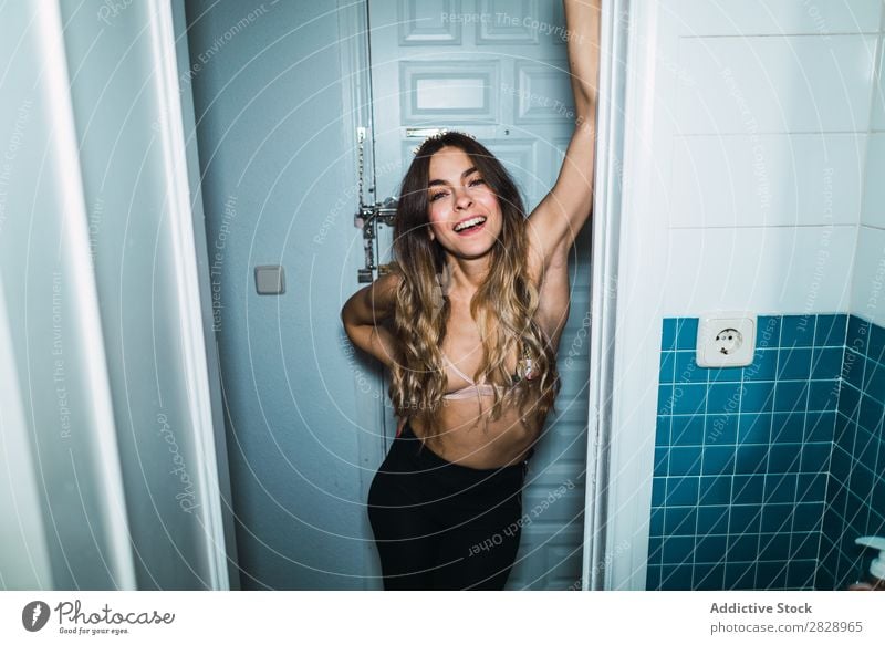 Attractive woman at bathroom Woman Youth (Young adults) Home Smiling Cheerful doorway Bathroom Lean Happy Expressive Posture Alluring Beautiful Human being