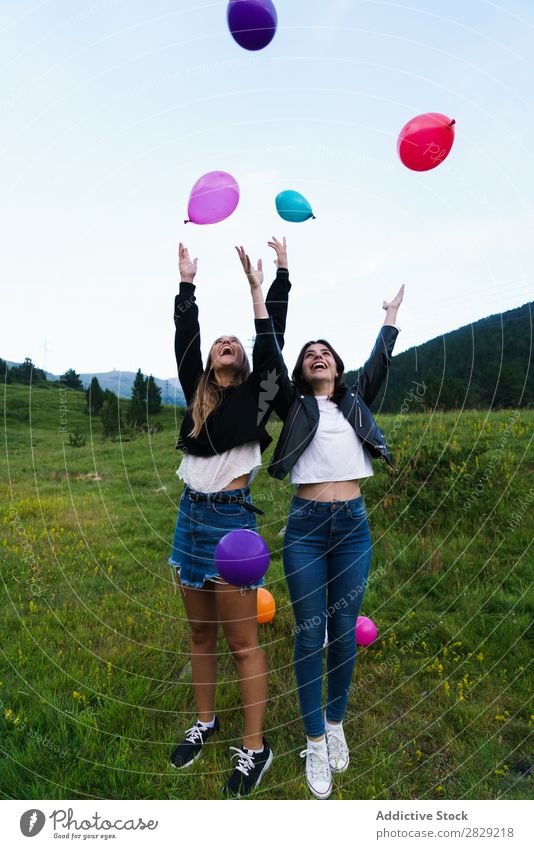 laughing women throwing up balloons Woman Nature Friendship Together Human being Hands up! pretty Posture Freedom Joy Beautiful Beauty Photography Happiness