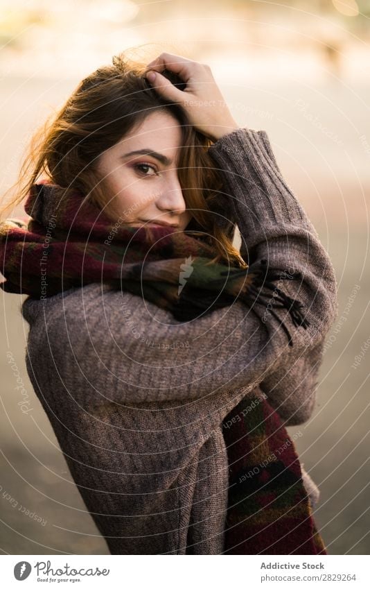 Woman posing in sweater holding hair Looking into the camera Sweater Cheerful Smiling Happy Youth (Young adults) Hair Beautiful Girl Attractive Self-confident