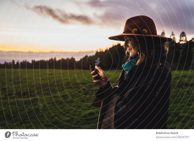 Woman in green cold fields Grassland Freedom Field Peaceful Nature Rural Wilderness scenery Stand Green Landscape Fog Dream Pasture Tourism tranquil Valley Cold