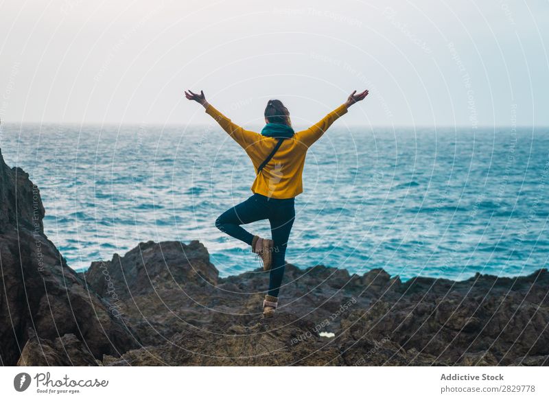 Woman with hands apart at seaside Nature Freedom Relaxation Stand Rock Coast Beach Vacation & Travel Ocean Photography Summer Tourist Tourism Landscape