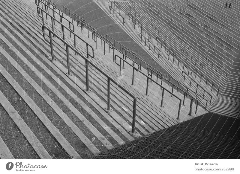 spectator terra Stands Sporting Complex Architecture Concrete Gray spectator ranks standing room persons void Empty Black & white photo Exterior shot Day