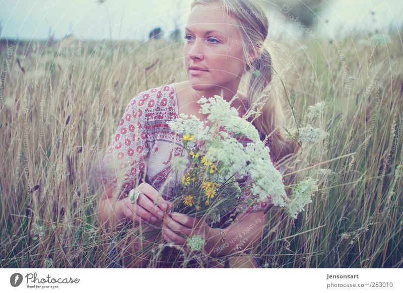 Blond girl on a flower meadow Lifestyle Harmonious Well-being Contentment Senses Relaxation Fragrance Trip Freedom Summer Summer vacation Human being Feminine