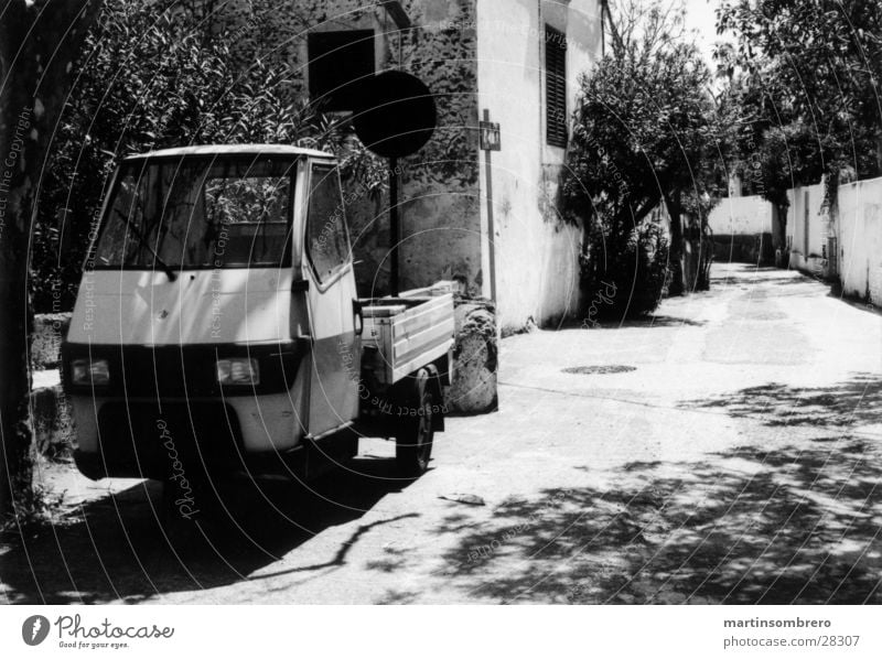 stromboli Alley House (Residential Structure) Romance Poverty South Italy Stromboli Driving Transport Street Black & white photo Car tricycle car moped car