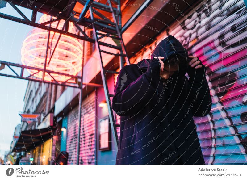 Man posing under neon circle handsome City Neon Stand Street Youth (Young adults) Town Lifestyle Easygoing Fashion Circle Style Adults Modern Human being