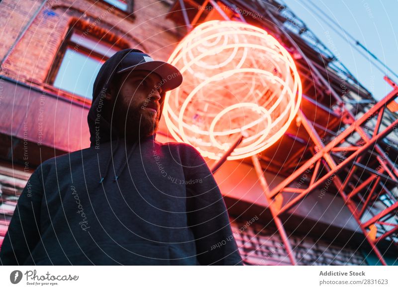 Man posing under neon circle handsome City Neon Stand Street Youth (Young adults) Town Lifestyle Easygoing Fashion Circle Style Adults Modern Human being
