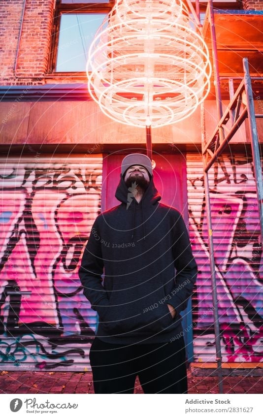 Man posing under neon circle handsome City Neon Stand Street Youth (Young adults) Town Lifestyle Easygoing Fashion Circle Style Adults Modern Human being