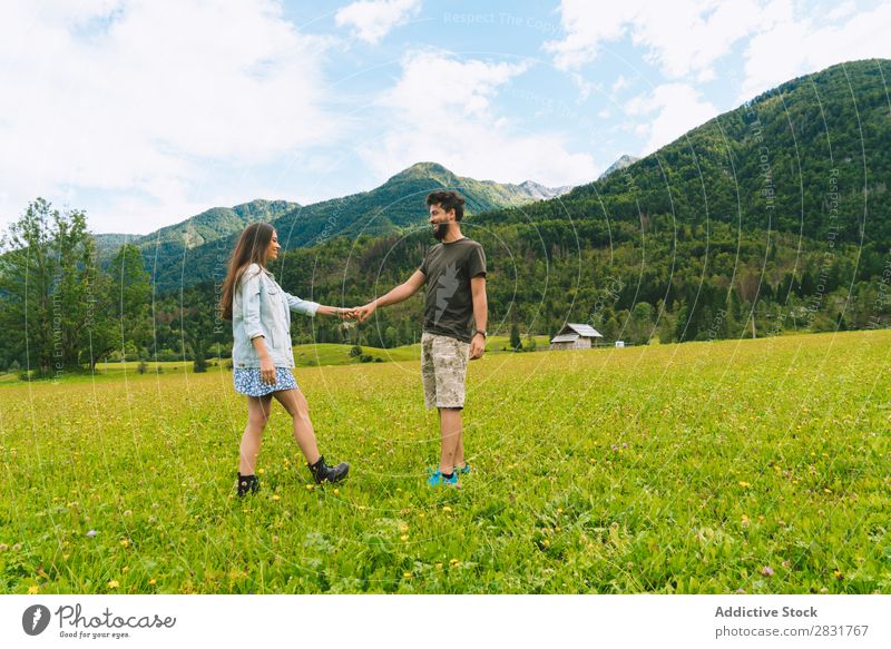 Couple on meadow in hills Meadow Hill holding hands Nature Summer Human being Man Woman Love Grass Beautiful Together Youth (Young adults) Happy Landscape