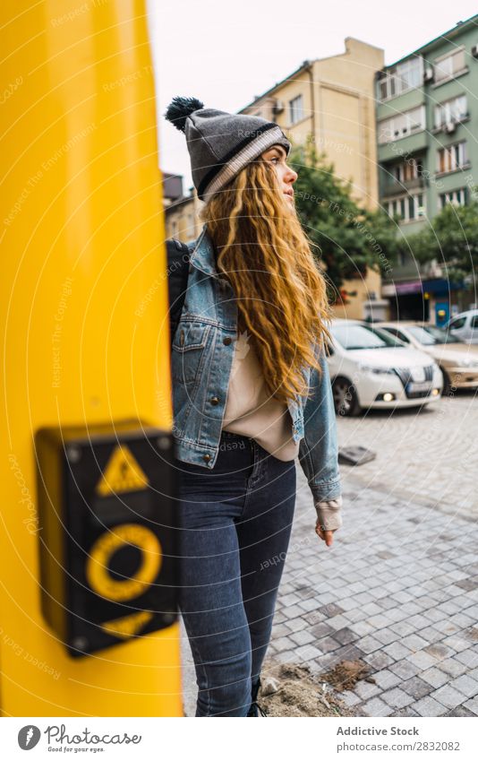 Casual girl walking down street looking way Woman Street Easygoing Pensive Youth (Young adults) Portrait photograph City Lifestyle Town Considerate Style