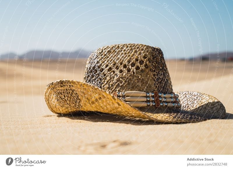 Straw hat on sand Sand Hat Cowboy Coast Vacation & Travel Beach enjoyment Compose Nature Headwear Resort Summer Leisure and hobbies Sunlight Dry Freedom