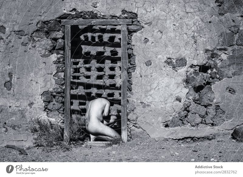 Nude man in doorway of ruined house Man Naked Body Ruin House (Residential Structure) Desert Black & white photo Sun Stand Masculine pose desolated Natural Skin