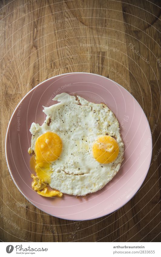 Fried egg face on wood Food Egg Fried egg sunny-side up Nutrition Breakfast Organic produce Vegetarian diet Slow food Crockery Plate Shopping Healthy