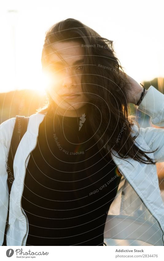 Sensual young woman in back lit Woman Posture Portrait photograph Style To enjoy Town Hipster Brunette Self-confident Youth (Young adults) Model Earnest