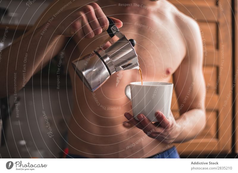 Shirtless man pouring coffee Human being Filling Cup Coffee Man Morning Mug Hot Drinking Breakfast Lifestyle Home Fresh Caffeine Pot Pour Portrait photograph