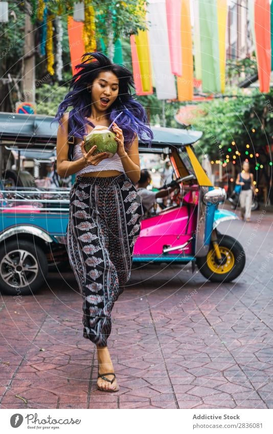 Young woman with coconut drink on street Woman pretty Street Youth (Young adults) Beautiful Portrait photograph Stand Coconut Drinking Straw Hair Purple asian