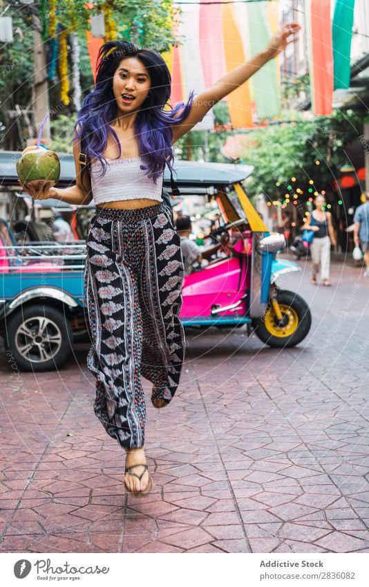 Young woman with coconut drink on street Woman pretty Street Youth (Young adults) Beautiful Portrait photograph Stand Coconut Drinking Straw Hair Purple asian