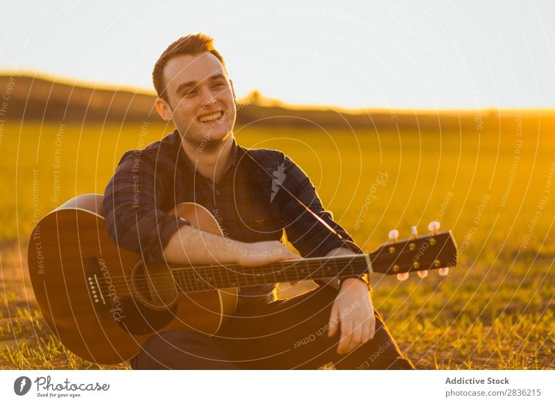 Man with guitar on field Guitar Nature Music Lifestyle Musician Easygoing Guitarist Acoustic Field Green Walking Musical Human being Guy Natural instrument