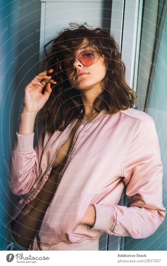 Seductive woman in jacket and sunglasses Woman Attractive Alluring Eroticism naked body Jacket Breasts Sunglasses Pink Home pretty Youth (Young adults) Posture