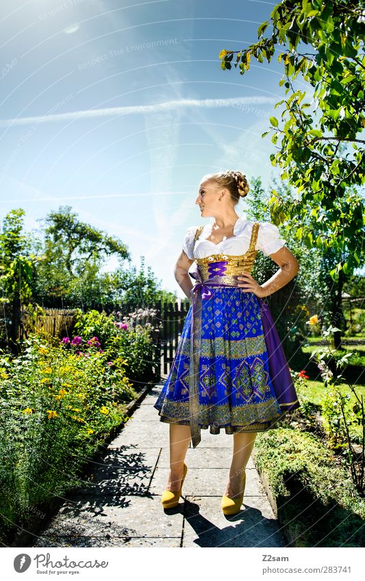 Madl II Style Oktoberfest Feminine Young woman Youth (Young adults) 18 - 30 years Adults Landscape Cloudless sky Sun Summer Tree Bushes Garden Dress