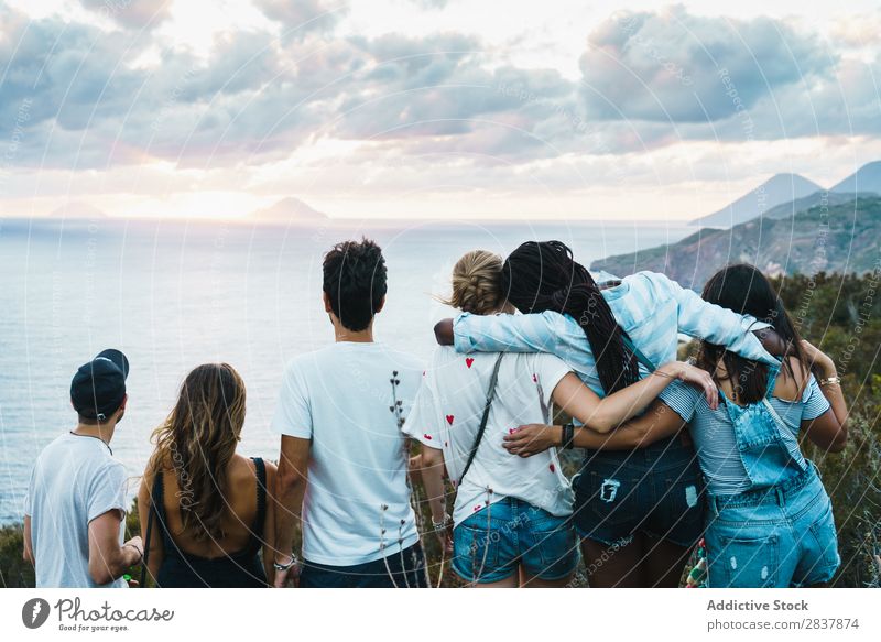 Group of people standing on cliff Human being Tourism Landscape Freedom Action Ocean Adventure Summer Exterior shot Vacation & Travel Tourist multiethnic Black