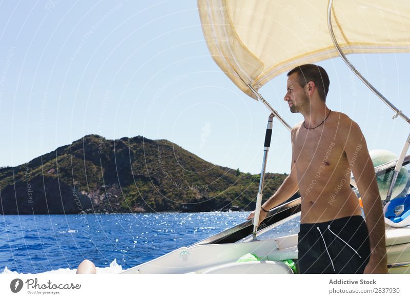 Man posing on ship Summer Sailboat Yacht Sailing Relaxation Ocean Vacation & Travel Vessel Communication travelers Leisure and hobbies Adventure Party Lifestyle