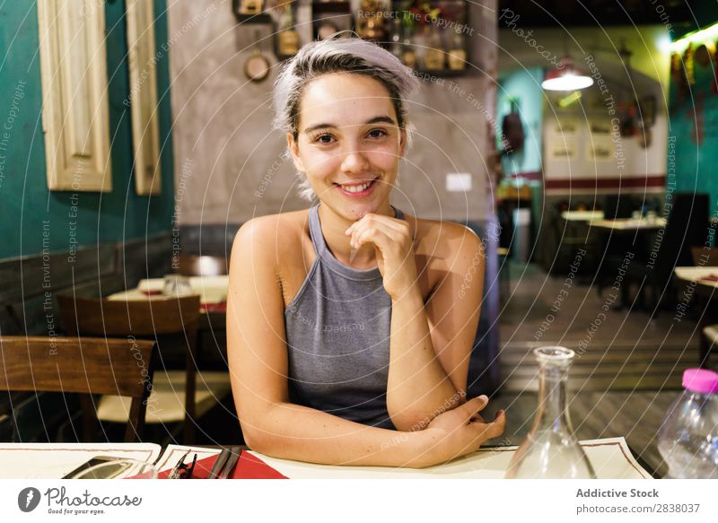 Young woman posing in a bar Woman Bar Posture Feasts & Celebrations Easygoing Drinking Relaxation Interior design Pub Beauty Photography Beverage Glass