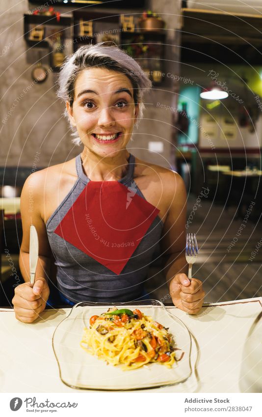 Content woman having meal Woman Plate Happiness Emotions Food Gourmet Grimace Dinner having fun Easygoing Hold Lunch pretend Preparation Café Dish