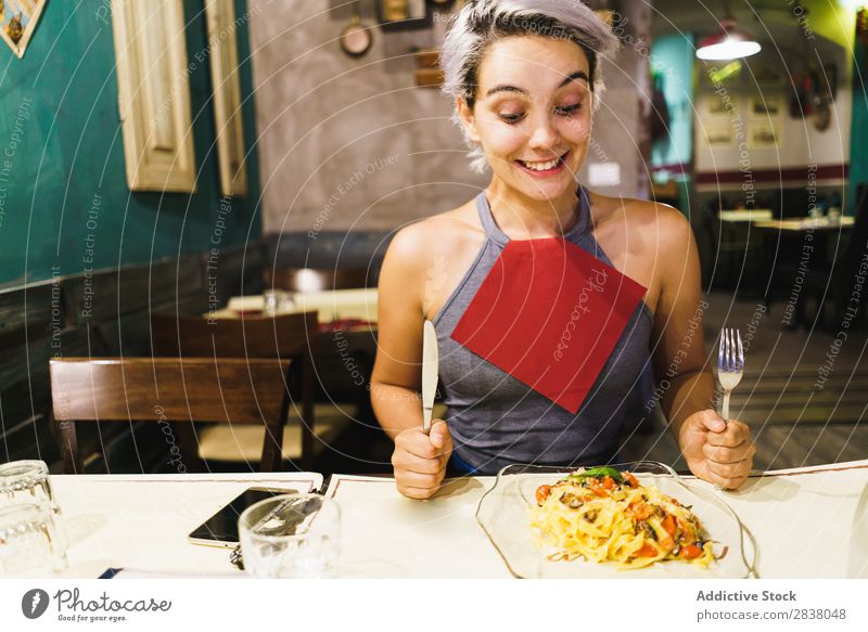Content woman having meal Woman Plate Happiness Emotions Food Gourmet Grimace Dinner having fun Easygoing Hold Lunch pretend Preparation Café Dish