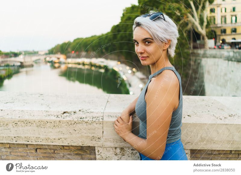 Young confident woman posing on bridge Woman Posture Self-confident Style romantic Summer Downtown Beauty Photography Tourism Natural Town Leisure and hobbies