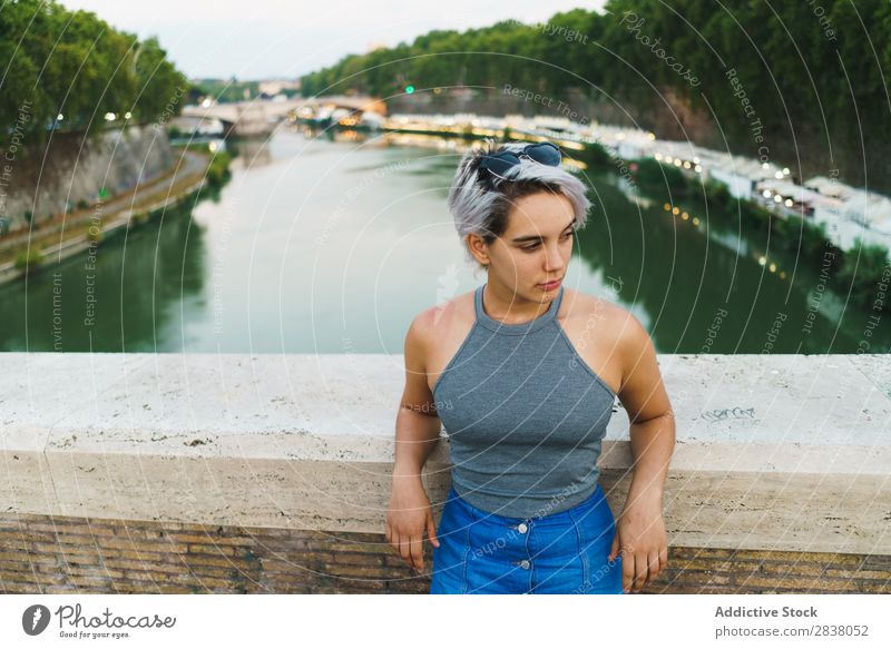 Young confident woman posing on bridge Woman Posture Self-confident Style romantic Summer Downtown Beauty Photography Tourism Natural Town Leisure and hobbies