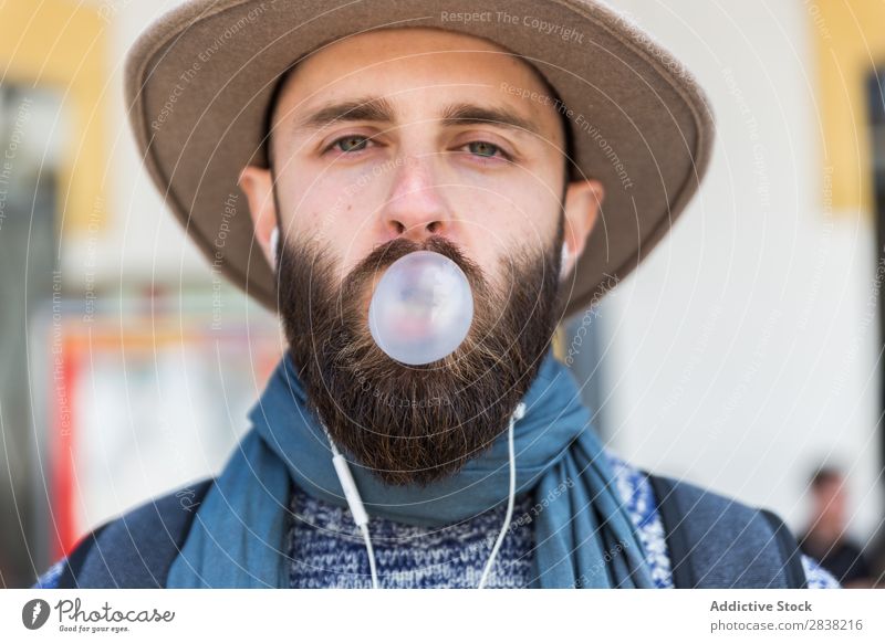Stylish man chewing a gum Man Gum Chew Bubble Blow Looking into the camera Close-up Face Portrait photograph Youth (Young adults) Chewing gum Fresh Expression