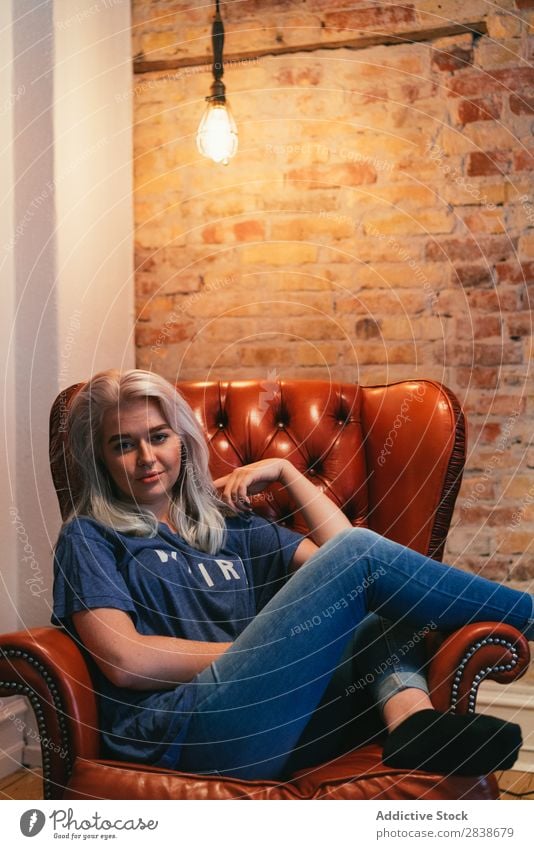 Blonde woman in armchair Woman pretty Home Youth (Young adults) Armchair Sit Resting Cozy Beautiful Lifestyle Beauty Photography Attractive Portrait photograph