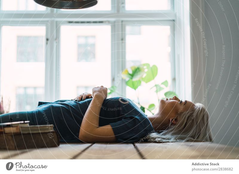 Smiling woman lying on table Woman pretty Home Youth (Young adults) Blonde Beautiful Table Lie (Untruth) Wood Lifestyle Beauty Photography Attractive