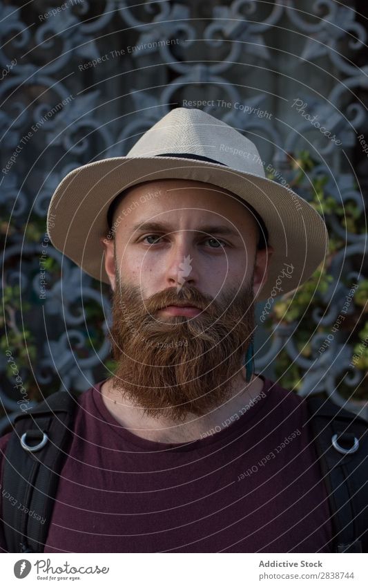 Portrait of bearded man with earring Man Brutal Earring brutality Masculine Lifestyle decor traveler Model Youth (Young adults) handsome Fashion Beard