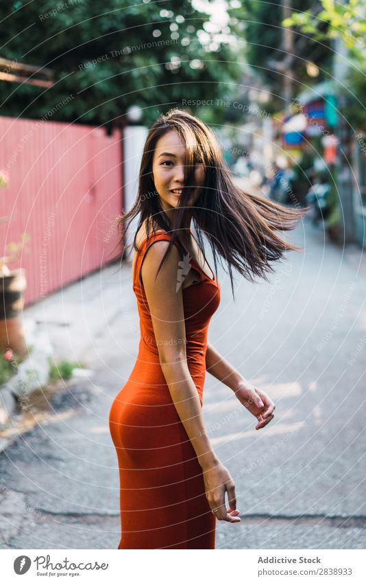 Cheerful woman posing on street Woman pretty asian Youth (Young adults) Happy Joy Street Green Town Beautiful Portrait photograph Attractive Beauty Photography