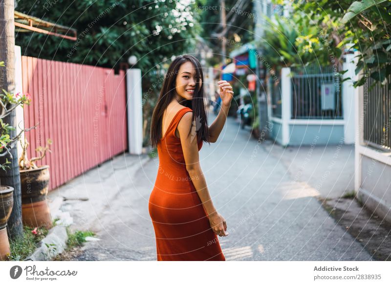 Cheerful woman posing on street Woman pretty asian Youth (Young adults) Happy Joy Street Green Town Beautiful Portrait photograph Attractive Beauty Photography
